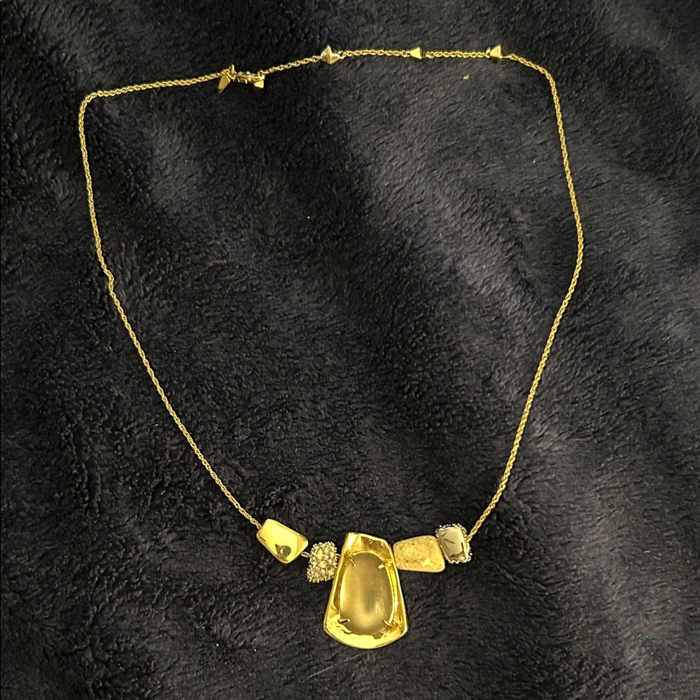 Alexis Bittar gold toned necklace with taupe ‘stone’